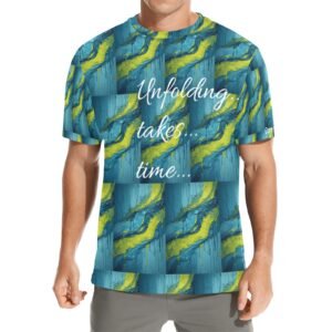A tee with flowing blue, green, and yellow abstract artwork and the phrase “Unfolding…takes…time…” printed across the front.